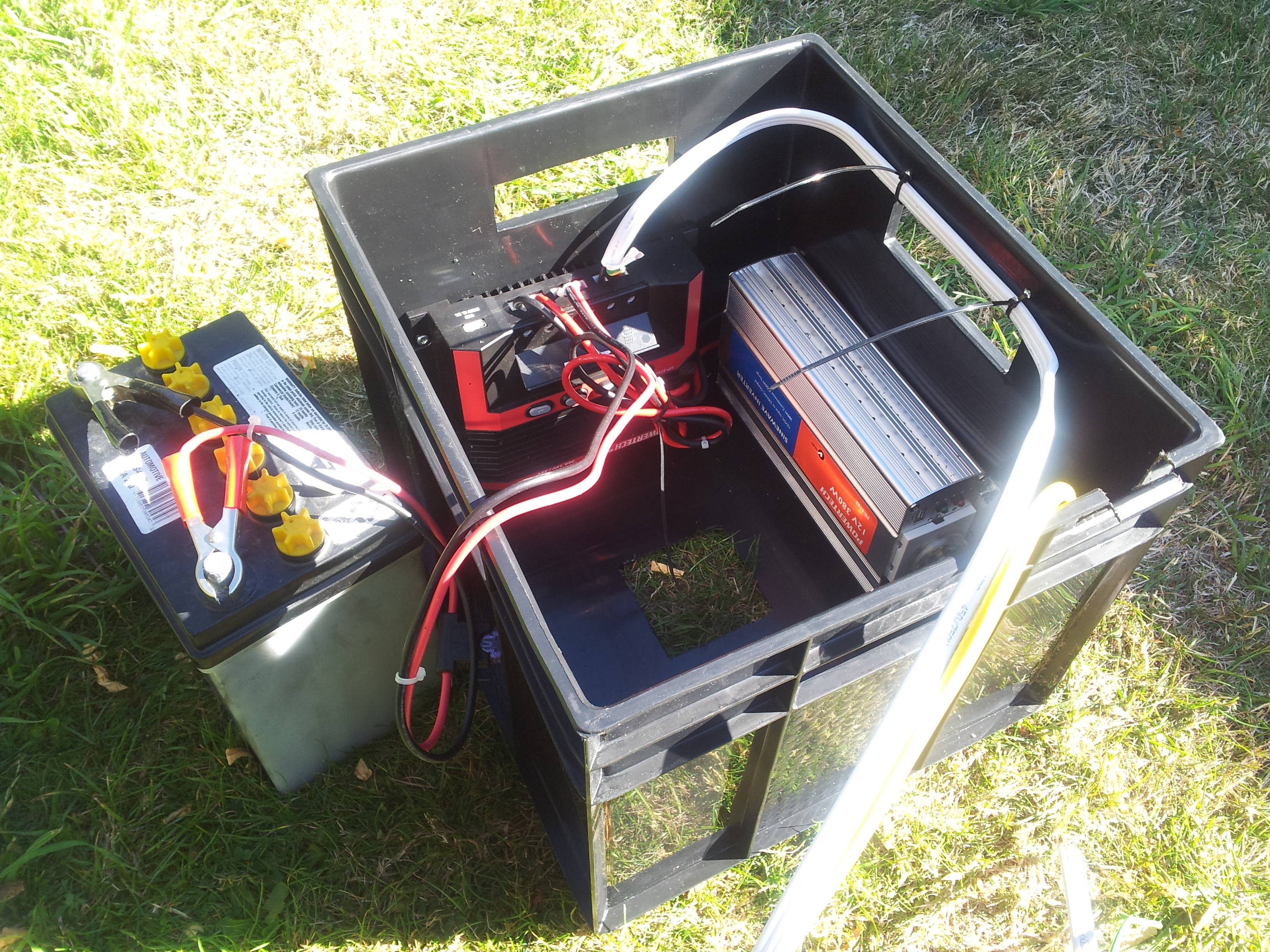 Box upside down showing charge controller and inverter